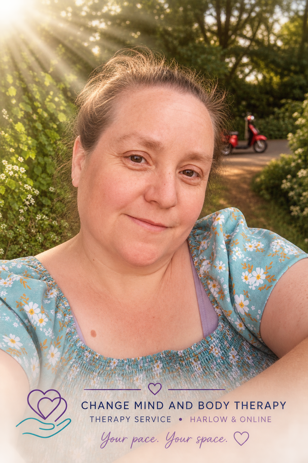 Portrait of therapist Sarah outdoors in soft sunlight